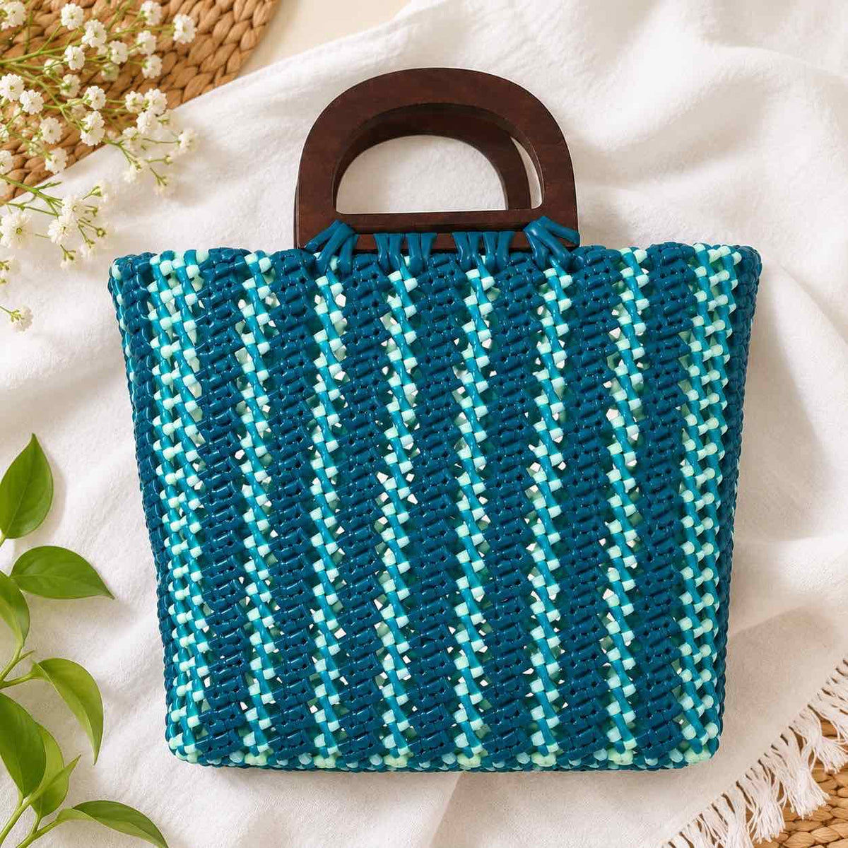 Blue woven tote bag