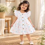 white muslin baby frock, heart print baby girl dress, pink and blue heart print frock, cotton muslin frill dress, newborn baby girl outfit, baby girl casual wear, wooden button frock, My Mini Buds baby clothing.