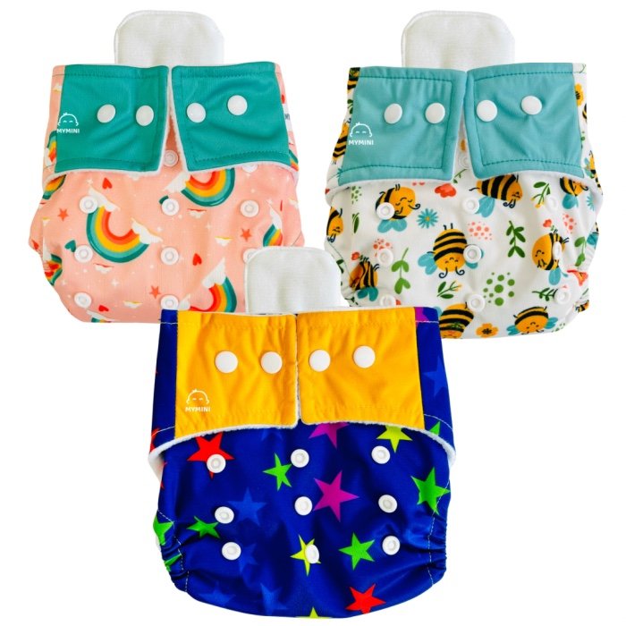 Reusable cloth diaper with absorbent inserts in soft breathable fabric for babies